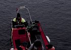 Karen being delivered to shore. : Base Brown